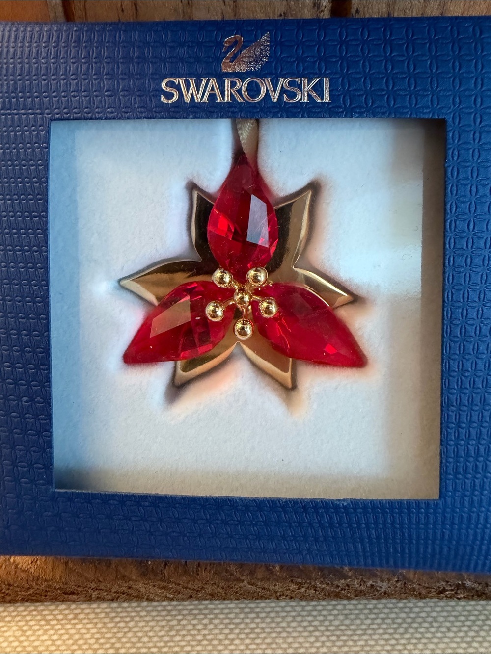 Swarovski Poinsettia Christmas Ornament- in original box Lightly used. Retired